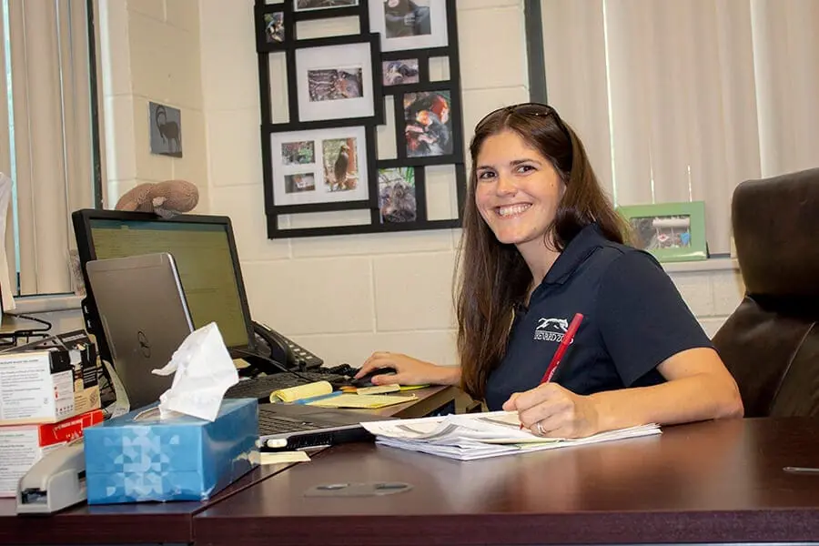 Registrar at desk