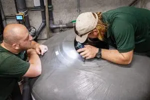 Our LSS team inspects a tank.