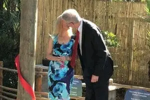 Supporters of the project share a kiss