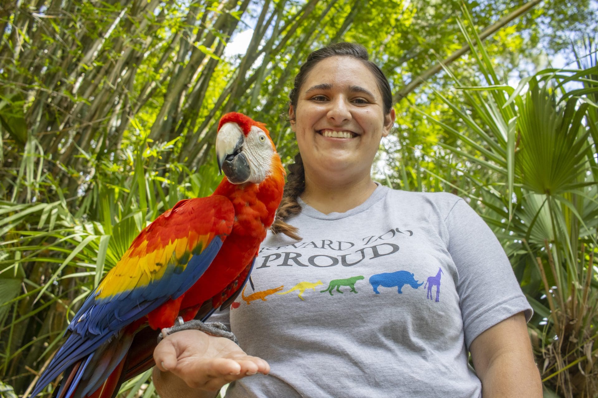Pride Week photo with Christen and macaw