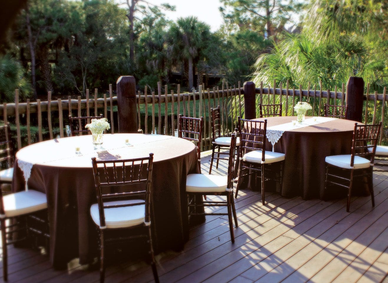 brevard zoo round tables on nyami nyami lodge deck