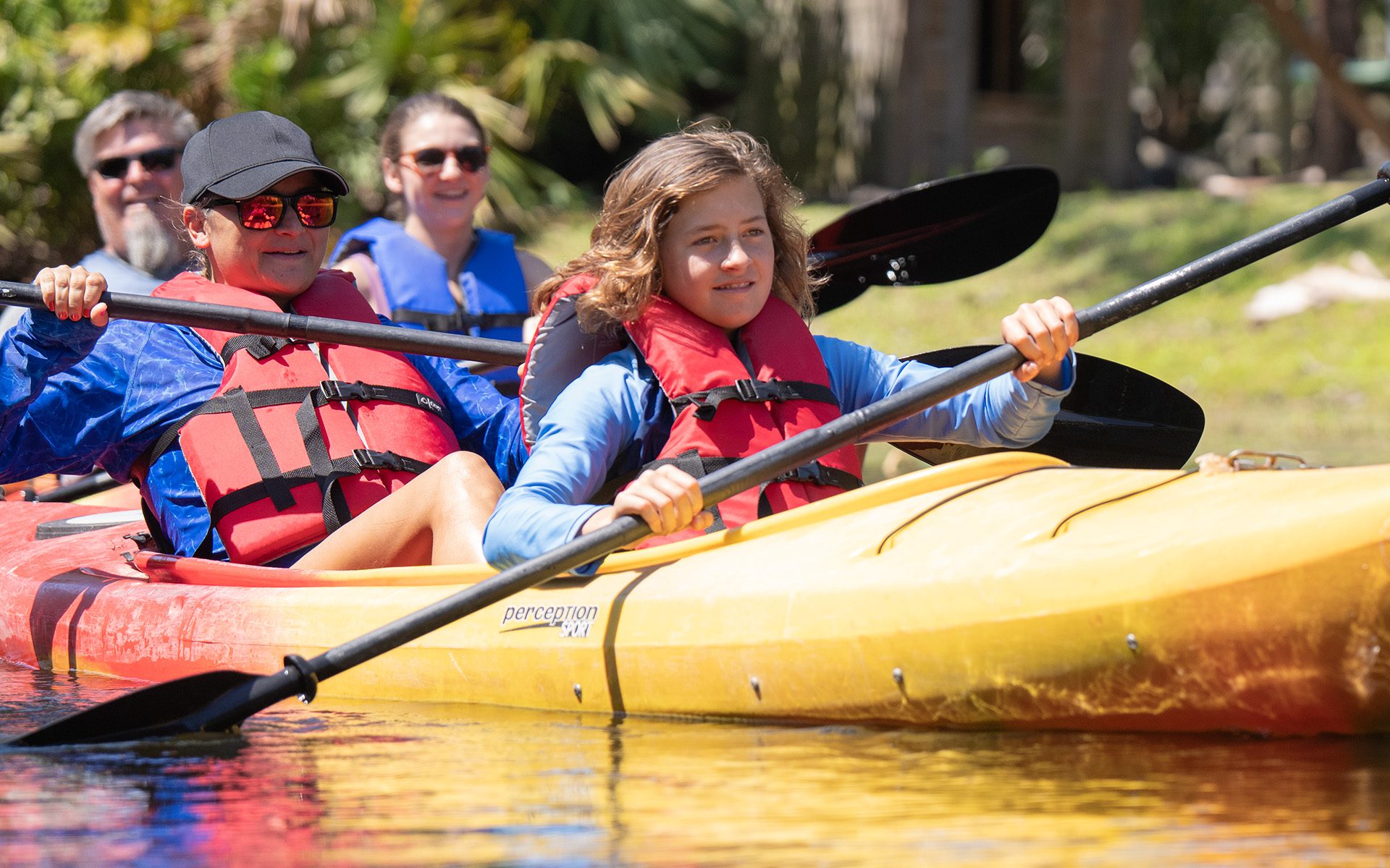group kayaking through the nyami nyami river