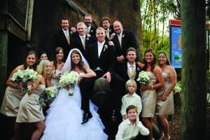 Wedding party posing inside Zoo