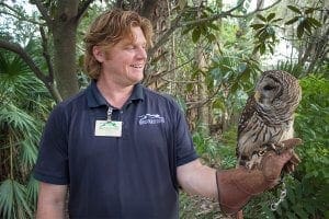 Keeper with a Barred Owl