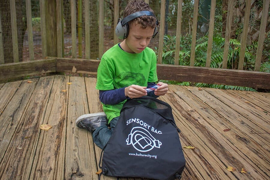 Boy using sensory bag